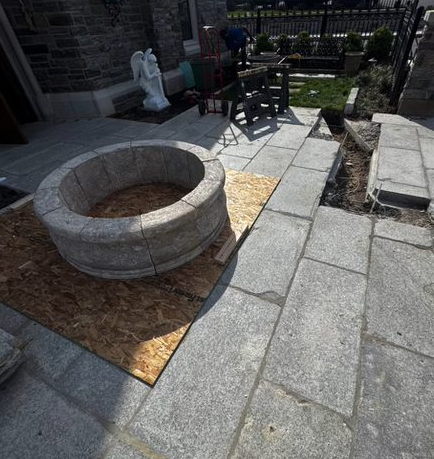 Outdoor decorative fountain being prepared for seasonal closing